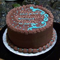 Turquoise And Chocolate 3-layer Kahlua cake with mocha icing.