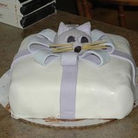 Cat Bow This was my first try at fondant. It was a ton of work and even more learning as I went along. Whiskers are uncooked spaghetti noodles (lol...