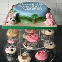 Down On The Farm A vanilla sponge cake I made for my son's birthday last year, with a few matching cupcakes (the sheep were my favourites!)