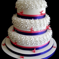 Pink Butterflies Loved this cake when it was finished, sugar daisies and flowerpaste butterflies