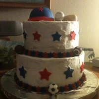 Sports Theam Baby Shower This is for my sisters baby shower it is butter cream frosting with fondant stars, hat & bat