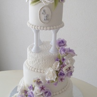 Soft Colors This is a cake I did in August. It is one of my favorites because of the soft colors of the gumpaste flowers. And I always love initials on...