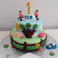 Farm Cake Farm cake for a little boy inspired by many other cakes and cakers. Alle characters and decorations made from marzipan. Cake filled with...
