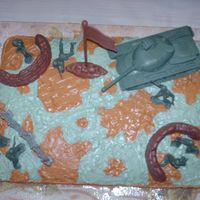 Camo Cake This cake was supposed to be camo...but when I finished with it, it kinda had a duel purpose...you can either see Camo, or grass and mud......