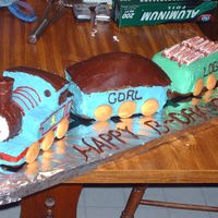 Thomas The Tank Engine This is the first 3D cake I made...my husband helped...It started as a basic train cake, and as we began to play, out came Thomas, which...