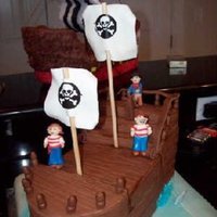Pirate Cake I made this cake for my nephews birthday. He loved pirates at the time. The pirate crew is sculpted out of fondant and made to resemble my...