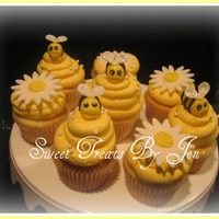 Baby Bumble Bee Cupcakes Bees made out of fondant.