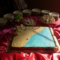 Beach Themed Grooms Cake I am 13 years old and I made this for my moms friend. The groom went to A&M which was incorperated in to the cake. The picture is not...