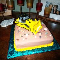 Heavy Equipment Cake I made this Heavy equipment cake for my daughter's father's birthday. 4-25-09