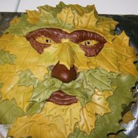 Green Man devils food with peppermint buttercream,covered in chocolate mmf, leaves are mmf, tfl