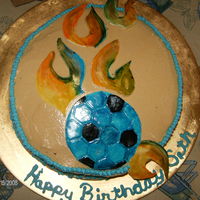 Flaming Soccer Ball chocolate cake with peanut butter frosting.. all accents made out of mmf