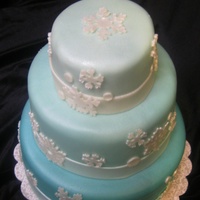 Snowflake Cake First cake I put a dowel in so it wouldn't fall over and it's listing more than the Titanic before she sank...