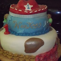 Cowboy 1St Birthday three tier cowboy cake inspired by the paper goods and invitations for the First birthday