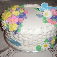 Wilton Course Two Final First time doing basket weave. Then I broke both my color flow pieces.. Nobody cared, it was eaten in a day anyway.