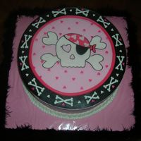 Happy Birthday Caitlin! Pink skull and cross bones made to match the invitations. Also a small smash cake for the birthday girl.