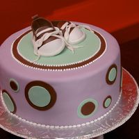 Baby Shoes I made this cake for my friend's baby shower (the colors matched the invitation). The cake is Chocolate Fudge with French Vanilla...