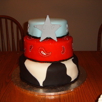 Western top tier is chocolate, rest is white cake. His personal cake was white cake also. Loved doing the bandana tier.