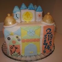 Its A Small World I made this cake for a friends birthday. Its a copy of the building that contains the Its a small world ride in Disneyland, CA.