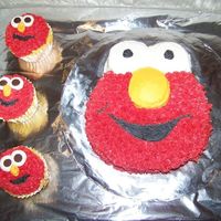 Elmo Smash Cake And Cupcakes This was for a friend's little boy's first birthday. Smash cake was a 6' round with cupcakes for the eyes. I used the star...