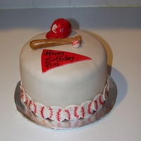 Baseball Birthday Made for a friend who is a big baseball fan. 6 inch pb cake covered in fondant, bat, hat, and baseballs made from fondant.