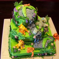 Jungle Cake My son wanted a jungle cake for his 3rd birthday. It's a 12 inch square with an 8 inch and 6 inch round stacked on top. Iced in...