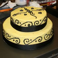 Yellow Practice Cake Not very pretty....I know!!!! This was just for practice/fun. This was my first attempt at a tiered cake. I made quite a few mistakes....I...