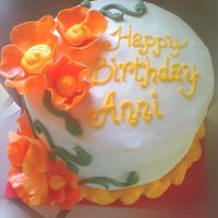 California Poppy Cake This is a 8" Birthday cake for a girl born August 1st. Her birth flower is the orange Poppy so she wanted poppies on it. It was a...
