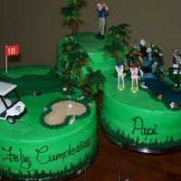 Golf Cake Cakes frosted with American buttercream, 18th hole was created using angel food cake, the waterfall was created using the ends of the angel...