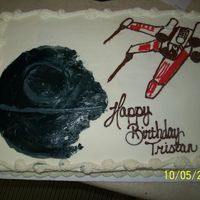 Star Wars Done for my brother in law's nephew. He wanted Star Wars...so I traced the Death Star and the ship onto the cake. I'm not an...