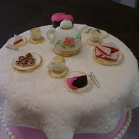 Tea Party My sister had me make this cake for a girl who babysits for her. For the babysitter's birthday she invited a bunch of girls including...