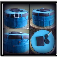 For The Man Of The House.../para El Hombre De La Casa... A pair of jeans inspired me to do this cake. The wallet and the belt are made of chocolate fondant, the key and the beeper are gum paste....