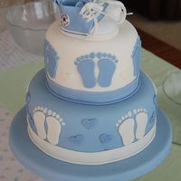 Baby Feet! WASC, Michele Foster's fondant, and IMBC with raspberry filling. Decorations are fondant, Converse sneakers are 50/50 gumpaste and...