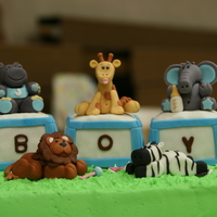 Baby Jungle Safari Cake This was made for my oldest daughter, who was pregnant with the first grandchild. Figures made out of fondant.