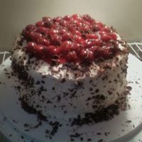 Black Forest Cake This is my second cake. I made it for my mom and she absolutely loved it. Sorry it's not the best picture, I was in a hurry.