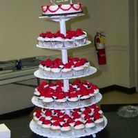 Cupcake Wedding Cake All BC icing. Each cupcake has an individual rose on them.