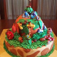 Jungle Birthday This cake is for my daughters 4th birthday tomarrow. She LOVES giraffes so I had to do something with them in it. The cake is 12"...