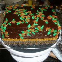 Chocolate.jpg Chocolate torted with bavarian cream between the layers, covered with chocolate rum ganache and decorated in buttercream vine and flowers