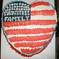 Our Family Reunion 2 layer 12" heart shaped marble cake with strawberry filling, decorated with buttercream to resemble the American Flag.
