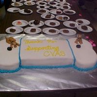 Dog Bone I decided to delete the collage picture of the cake. This view is better. It was 4- 9x13, and 4- 8" rounds, filled in the middle with...