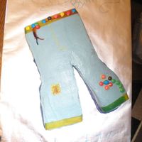 Blue Jeans Cake Marble cake, blue buttercream with chocolate filling. Belt and designs are fruit roll ups and M & Ms. This was for an 11 yr. old girls...