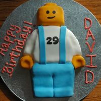 Lego Minifig For a LEGO-lovers birthday! Yellow cake, iced in buttercream and covered in fondant.