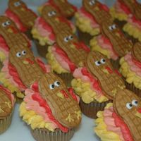 Turkey Cupcakes Spice cake cupcakes, iced with BC. I used a nutter-butter cookie for the turkeys body. So fun to do!