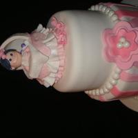 Baby Shower/ Christening I made this cake for my friend's daughter.It's my first time to try making a human figure and a basssinet. I made lots of trial...