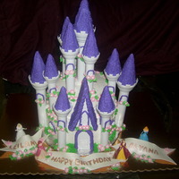 Castle Cake I did 300 little pink gumpaste flowers for this castle cake lol