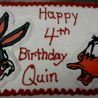 Looney Friends Images were done with frozen buttercream, reverse image piping. All buttercream frosting. Cake is chocolate & vanilla. He love it!