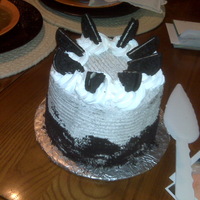 Cookies And Creme Torte I had to try out this cake after seeing the YummyArts video for this cake. I used Sam's Non-Dairy Cream Topping for the cake and it...