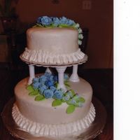 Wilton Course 3 Finale Cake I made my own marshmallow fondant for this cake and I didn't like it too much for covering the cake. i think the rest came out great