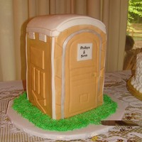 Porta-Potty All chocolate cake on inside, iced with BC icing fondant accents. This cake was the grooms cake for a 50th anniversary. The groom owns a...