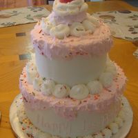 Ice Cream Social All buttercream icing with sprinkles and a fondant strawberry on top.