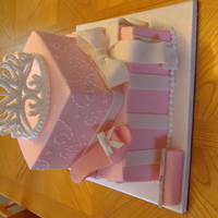 Fit For A Princess All BC icing with fondant accents. Shoe, Purse and bow are Fondant and the Tiara is Royal Icing.